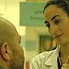 Lior Raz and Laëtitia Eïdo in Fauda (2015)