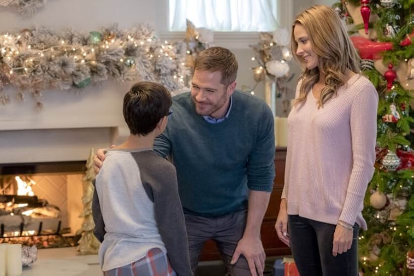 Jill Wagner, Luke Macfarlane, and Lauren Guci in Karen Kingsbury's Maggie's Christmas Miracle (2017)