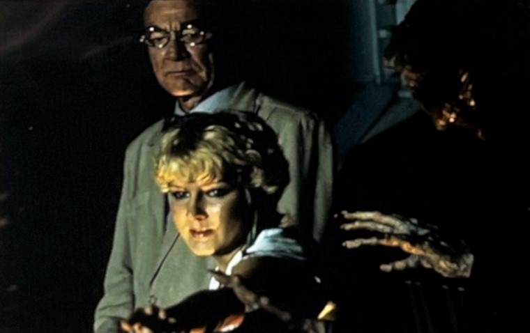 Diana Scarwid and Kenneth Tobey in Strange Invaders (1983)