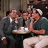 Gene Kelly, Benny Carter, Gino Corrado, Paul Cristo, Georges Guétary, Oscar Levant, and Waclaw Rekwart in An American in Paris (1951)