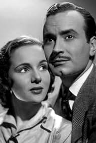 Ángel Magaña and María Duval in Cuando florezca el naranjo (1943)