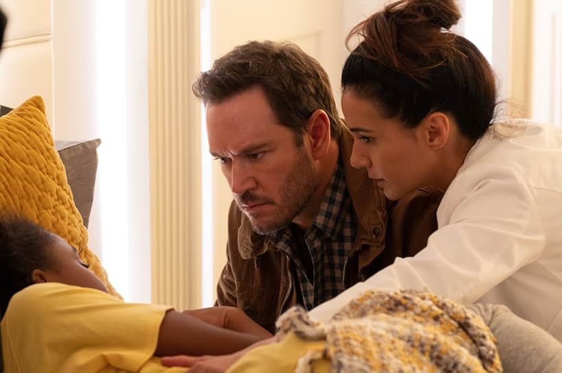 Emmanuelle Chriqui, Mark-Paul Gosselaar, and Saniyya Sidney in The Passage (2019)