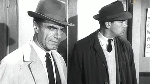 Charles Korvin and Richard Leech in Interpol Calling (1959)