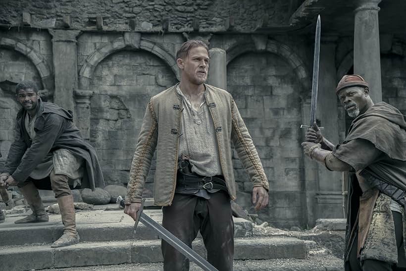 Djimon Hounsou, Charlie Hunnam, and Kingsley Ben-Adir in King Arthur: Legend of the Sword (2017)