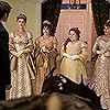 Polly Walker, Rupert Young, Nicola Coughlan, Bessie Carter, and Harriet Cains in Capital R Rake (2022)