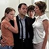 José Garcia, Geordy Couturiau, Karin Viard, and Christa Théret in Le couperet (2005)