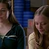 Tina Majorino and Amanda Seyfried in Big Love (2006)