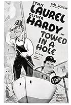 Oliver Hardy and Stan Laurel in Towed in a Hole (1932)