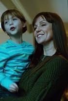 Sarah-Jane Redmond and Jacob Tremblay in Motive (2013)