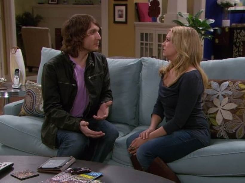 Melissa Joan Hart and Scott Michael Foster in Melissa & Joey (2010)