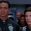 Sandra Bullock and Benjamin Bratt in Demolition Man (1993)