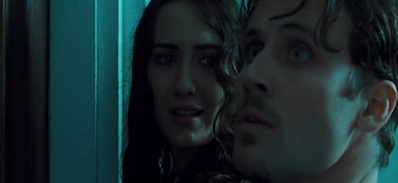 Alex Feldman and Madeline Zima in The Collector (2009)