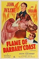 John Wayne, Ann Dvorak, and Joseph Schildkraut in Flame of Barbary Coast (1945)