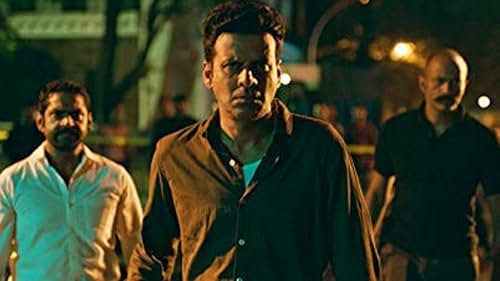 Manoj Bajpayee, Kishore Kumar G., and Sharib Hashmi in The Family Man (2019)