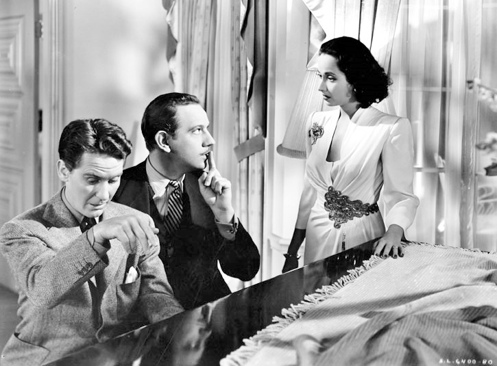 Melvyn Douglas, Burgess Meredith, and Merle Oberon in That Uncertain Feeling (1941)