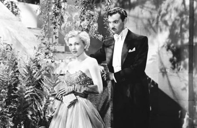 Joan Fontaine and Zachary Scott in Born to Be Bad (1950)