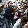 Brad Pitt, Mireille Enos, Sterling Jerins, and Abigail Hargrove in World War Z (2013)