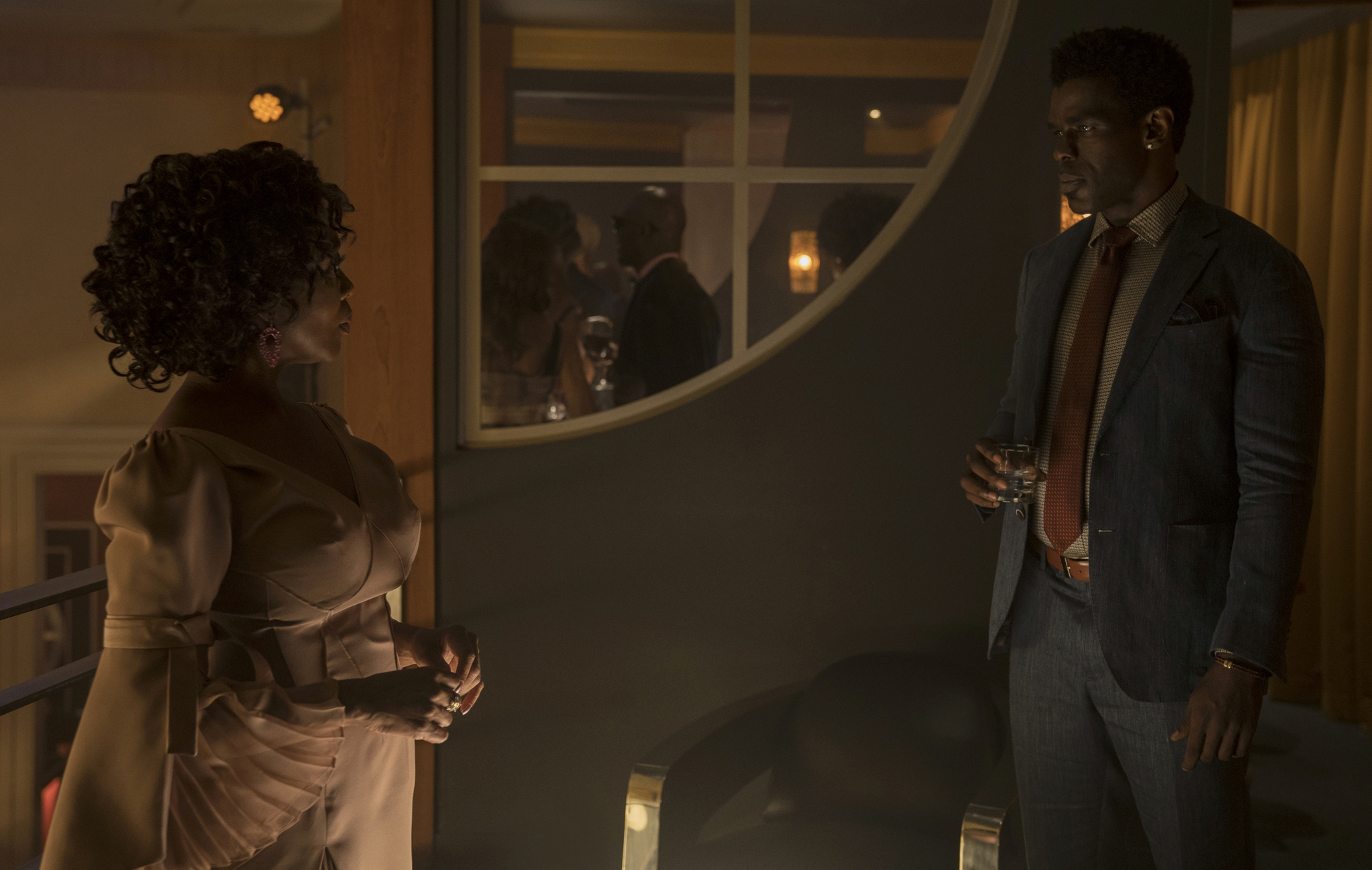 Alfre Woodard and Mustafa Shakir in Luke Cage (2016)