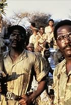 Ken Gampu and Richard Roundtree in Game for Vultures (1979)