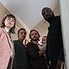 Aasif Mandvi, Katja Herbers, Michael Stahl-David, and Mike Colter in Rose390 (2019)