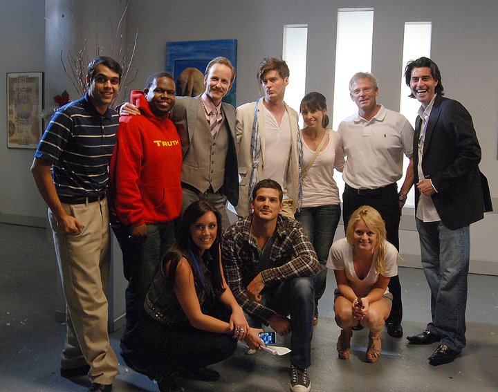 Lacey Chabert, Christopher Redman, Jermaine Williams, David J. Phillips, Justin L. Levine, Rick Malambri, Fallon Goodson, Anand Desai-Barochia, and Kaylen Davidson in A Holiday Heist (2011)