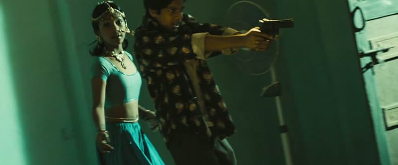 Ashutosh Lobo Gajiwala and Tanvi Ganesh Lonkar in Slumdog Millionaire (2008)