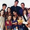 Ashley Olsen, John Stamos, Andrea Barber, Candace Cameron Bure, Dave Coulier, Lori Loughlin, Bob Saget, Jodie Sweetin, Blake Tuomy-Wilhoit, Dylan Tuomy-Wilhoit, and Scott Weinger in Full House (1987)