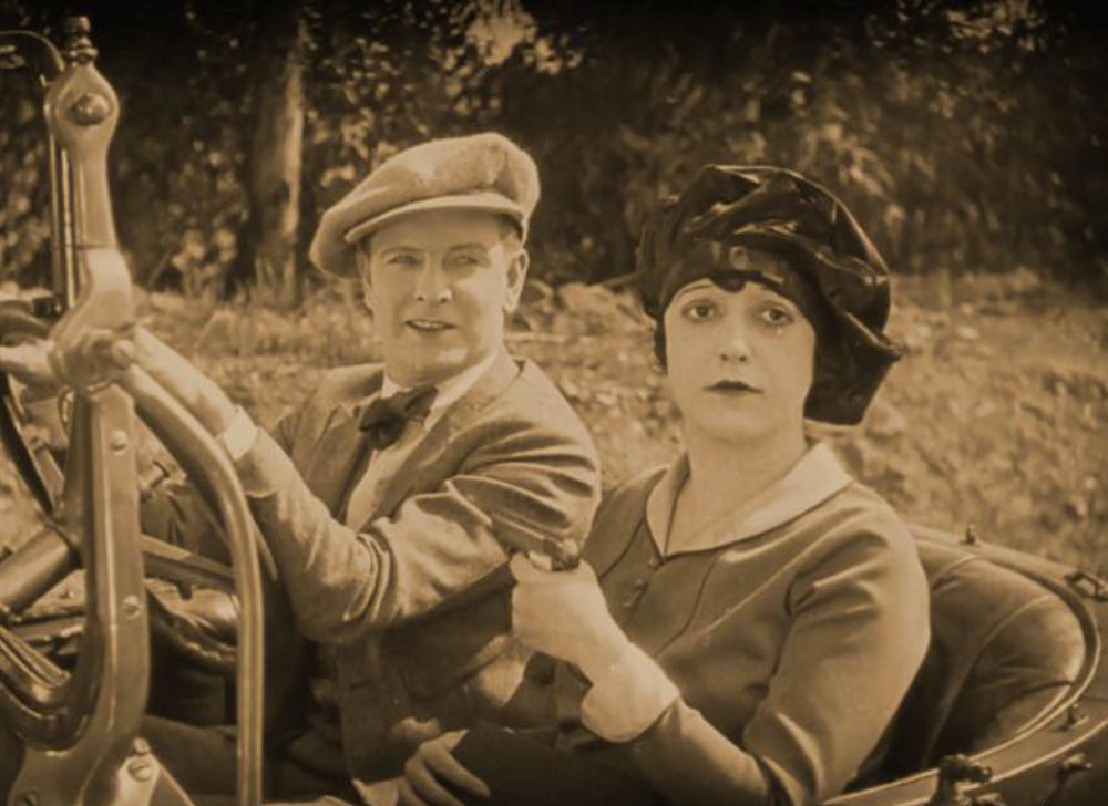 Creighton Hale and Mabel Normand in Should Men Walk Home? (1927)