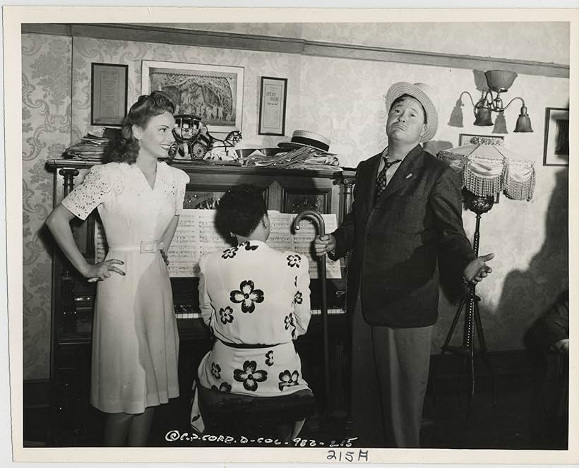 Janet Blair, Jack Oakie, and Hazel Scott in Something to Shout About (1943)