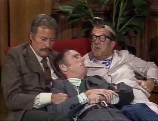 Dick Martin, Dan Rowan, and Phil Silvers in Rowan & Martin's Laugh-In (1967)