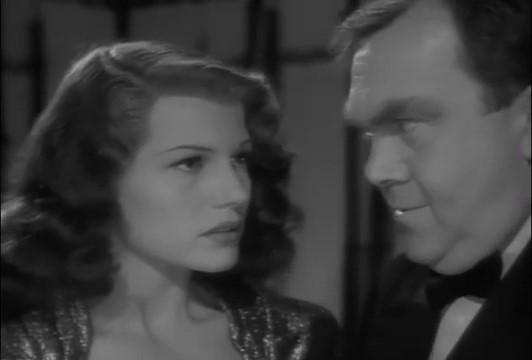 Rita Hayworth and Thomas Mitchell in Tales of Manhattan (1942)