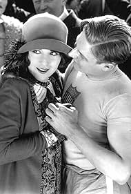 Helen Ferguson and Charles Paddock in Nine and Three-Fifths Seconds (1925)