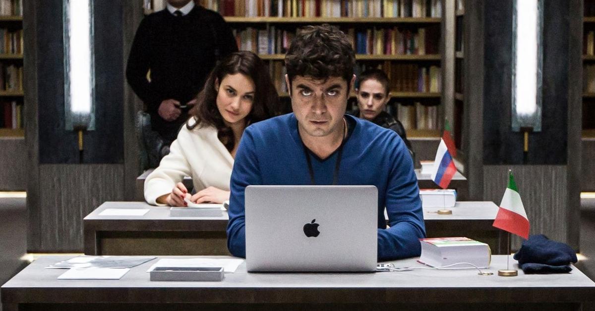 Riccardo Scamarcio, Olga Kurylenko, and Maria Leite in The Translators (2019)