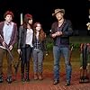 Woody Harrelson, Jesse Eisenberg, Abigail Breslin, and Emma Stone in Zombieland (2009)