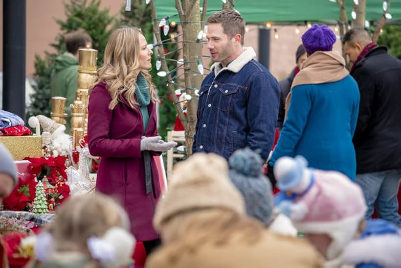 Jill Wagner and Luke Macfarlane in Karen Kingsbury's Maggie's Christmas Miracle (2017)