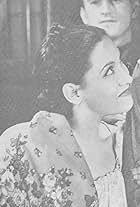 Elvira Ríos in Cupid Rides the Range (1939)