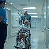 Bruce Willis, Jonathan Galanis, and Nicky Whelan in Trauma Center (2019)