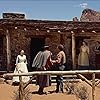 John Wayne, Walter Coy, Dorothy Jordan, Robert Lyden, Pippa Scott, and Lana Wood in The Searchers (1956)