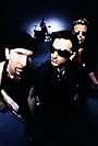 Bono, Adam Clayton, Larry Mullen Jr., and The Edge in U2: The Best of 1990-2000 (2002)