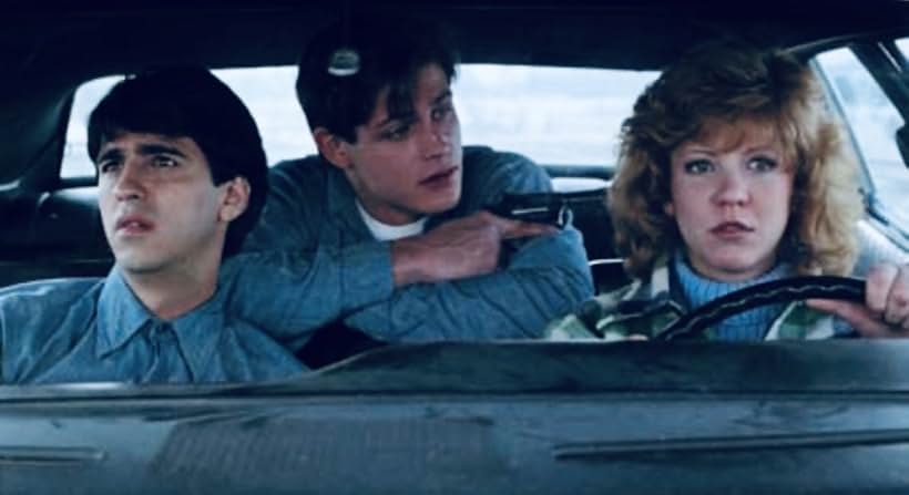 Nancy Allen, Michael Paré, and Bobby Di Cicco in The Philadelphia Experiment (1984)