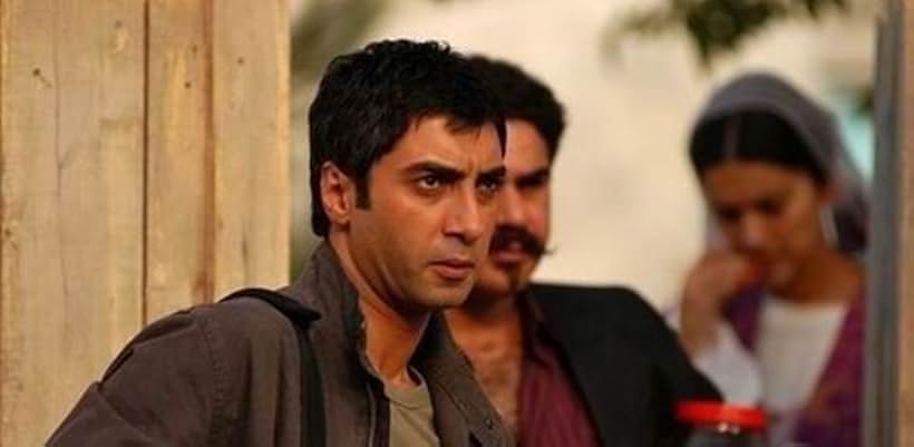 Necati Sasmaz, Erhan Ufak, and Bergüzar Korel in Kurtlar Vadisi: Irak (2006)