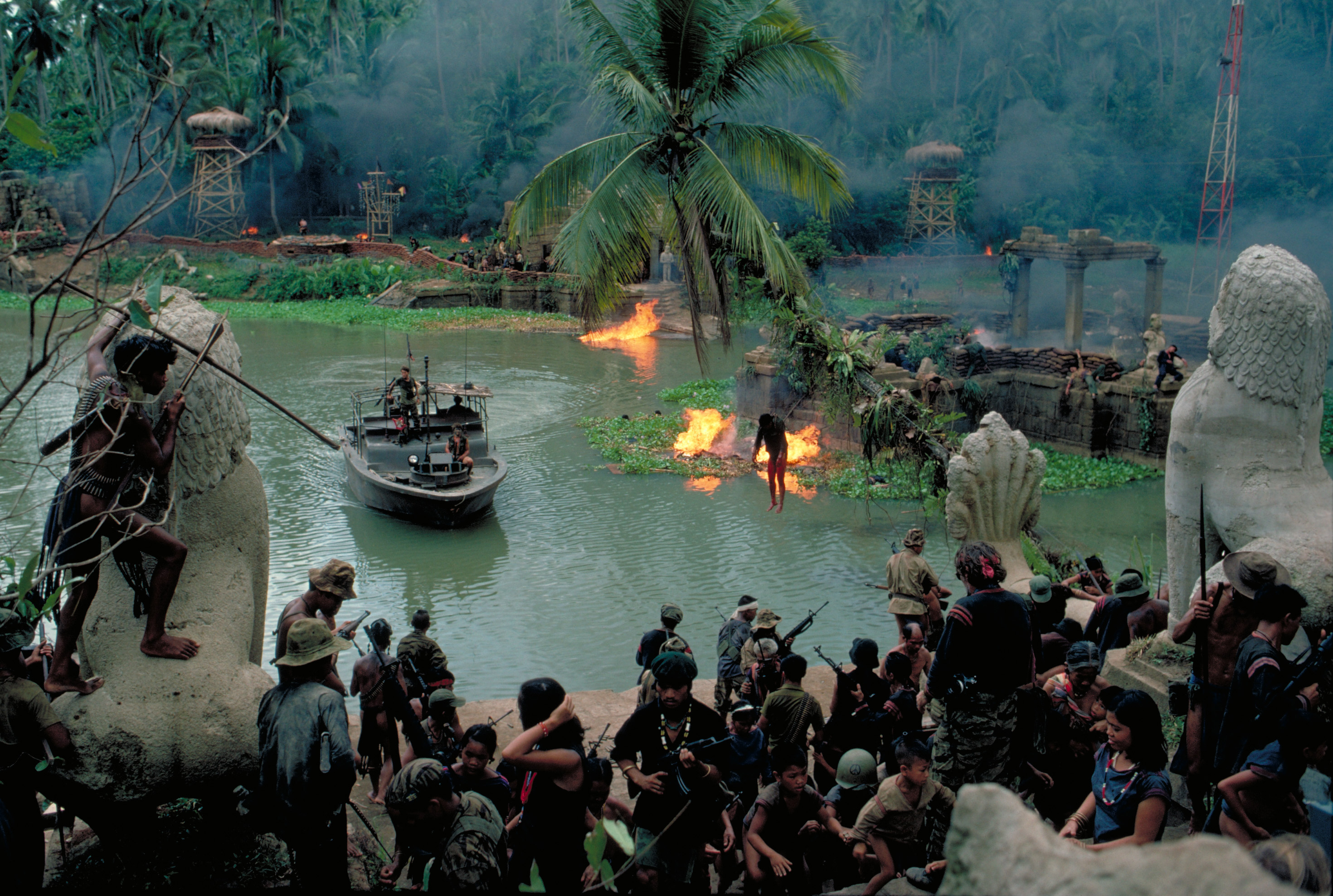 Dennis Hopper, Martin Sheen, Frederic Forrest, and Sam Bottoms in Apocalypse Now (1979)