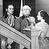 Charles Laughton, Fredric March, and Norma Shearer in The Barretts of Wimpole Street (1934)