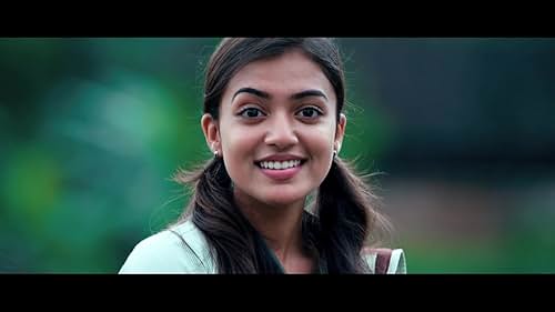 Watch Ohm Shanthi Oshaana (2014) Trailer