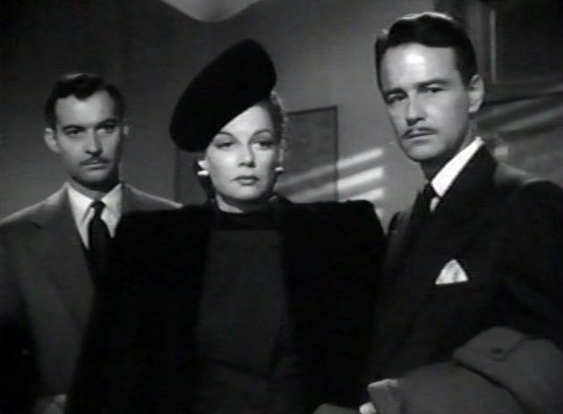 Lew Ayres, Zachary Scott, and Ann Sheridan in The Unfaithful (1947)