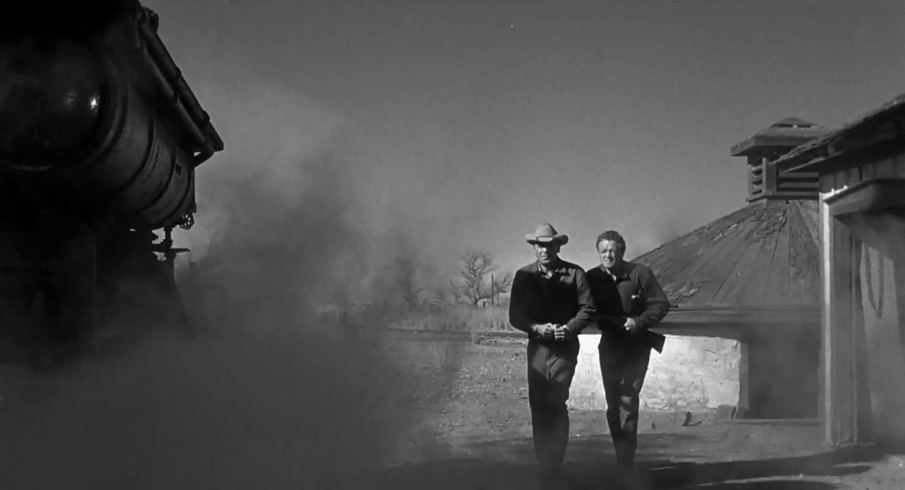 Glenn Ford and Van Heflin in 3:10 to Yuma (1957)