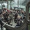 Peter Franzén, Katheryn Winnick, Katie Castle, Amy Donnelly, Lisa Watson, Travis Fimmel, Dianne Doan, Edvin Endre, Georgia Hirst, Kristine Kenina, Luke Shanahan, and Stephen Rockett in Vikings (2013)