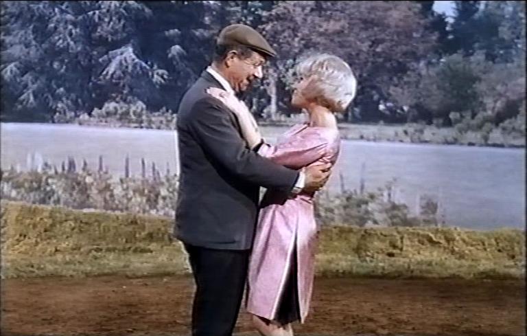 Sophie Hardy and Sidney James in Three Hats for Lisa (1965)