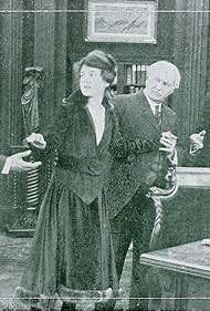 Marguerite Courtot and Richard Purdon in The Ancient Coin (1915)