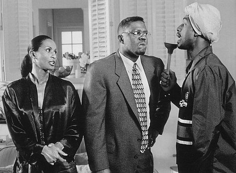 Bill Bellamy, Bernie Mac, and Beverly Johnson in How to Be a Player (1997)